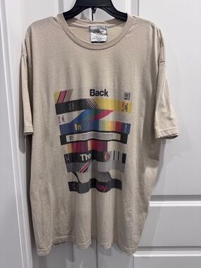 Kid Dangerous Beige Short Sleeve Tee with Multicolor Graphic